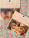 Bijoux de visage noirs et rouges scintillants pour maquillage Halloween enfant – Konges Sløjd