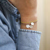 Bracelet doré fin avec médaille en porcelaine blanche et lune dorée bijou femme idée cadeau symbolique