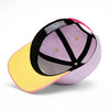 Casquette enfant Mini Purply Hello Hossy : design coloré en violet et rose, tendance et éco-responsable. Idéale pour un look fun et stylé au quotidien.
