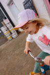 Casquette enfant Mini Purply Hello Hossy : design coloré en violet et rose, tendance et éco-responsable. Idéale pour un look fun et stylé au quotidien.