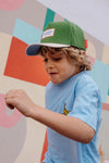 Casquette enfant et papa Mini Olea Hello Hossy : design tendance en vert et beige, éco-responsable et confortable. Parfaite pour un look cool et assorti !