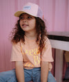 Casquette enfant Powder Pink Hello Hossy : design tendance en rose poudré et beige avec filet respirant. Confortable et stylée, idéale pour un look estival !