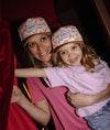 Casquette enfant Hello Hossy Springtime beige motif fleurs et visière orange – accessoire enfant été tendance