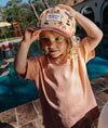 Casquette enfant Hello Hossy Unicorn beige motif licornes et visière rose – accessoire enfant été tendance