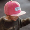 Casquette enfant Hello Hossy velours Pitaya rose framboise et visière rose clair