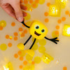 Personnage Alex jaune et cubes lumineux pour le bain Glo Pals.