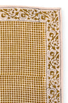 Petit foulard "Manika Mosaic Tobacco" de la marque Apaches Collections. Accessoire en coton doux avec un motif mosaïque géométrique et des bordures florales dans des tons tabac et beige. Idéal pour sublimer une tenue avec une touche bohème et chic, ce foulard peut se porter autour du cou, en bandeau ou en accessoire de sac.