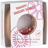 Hochet sensoriel Donut Tomates Petit Boum – jouet d’éveil en bois et plastique transparent pour bébé