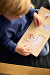 Livre puzzle Dreamy Adventurers Filibabba avec illustrations poétiques d’animaux et montgolfières