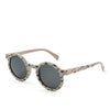 Lunettes de soleil enfant Liewood imprimé dinosaures – modèle Darla Junior
