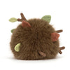 Peluche enfant marron effet bois avec feuilles et visage souriant