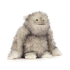 Peluche monstre poilu gris et blanc avec visage mignon et doux