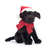Peluche labrador noir de Noël Pippa Jellycat – chien en peluche avec bonnet et nœud rouge