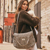 Sac à langer Bebel Middle léopard beige avec anses en tissu