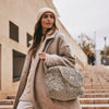 Sac à langer Bebel Middle léopard beige avec anses en tissu