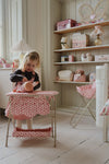 Table à langer Rosie Rose pour poupées Konges Slojd avec étagère et tissu fleuri rose