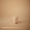 Tasse d’apprentissage avec anses et bec verseur en plastique PP ivoire Mushie – Concept store famille