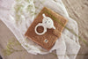 Protège carnet de santé boucle - Biscuit - Jollein